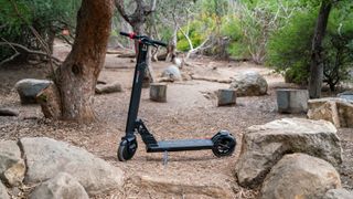 TurboAnt V8 Dual-Battery Electric Scooter at a park