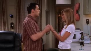 Joey and Rachel holding hands in Friends.