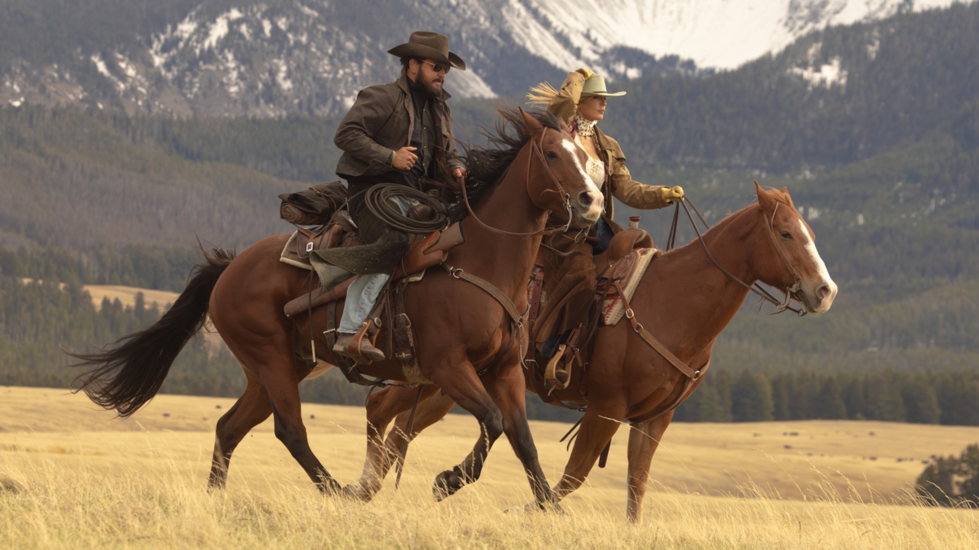 From left to right: Rip and Beth riding horses. 