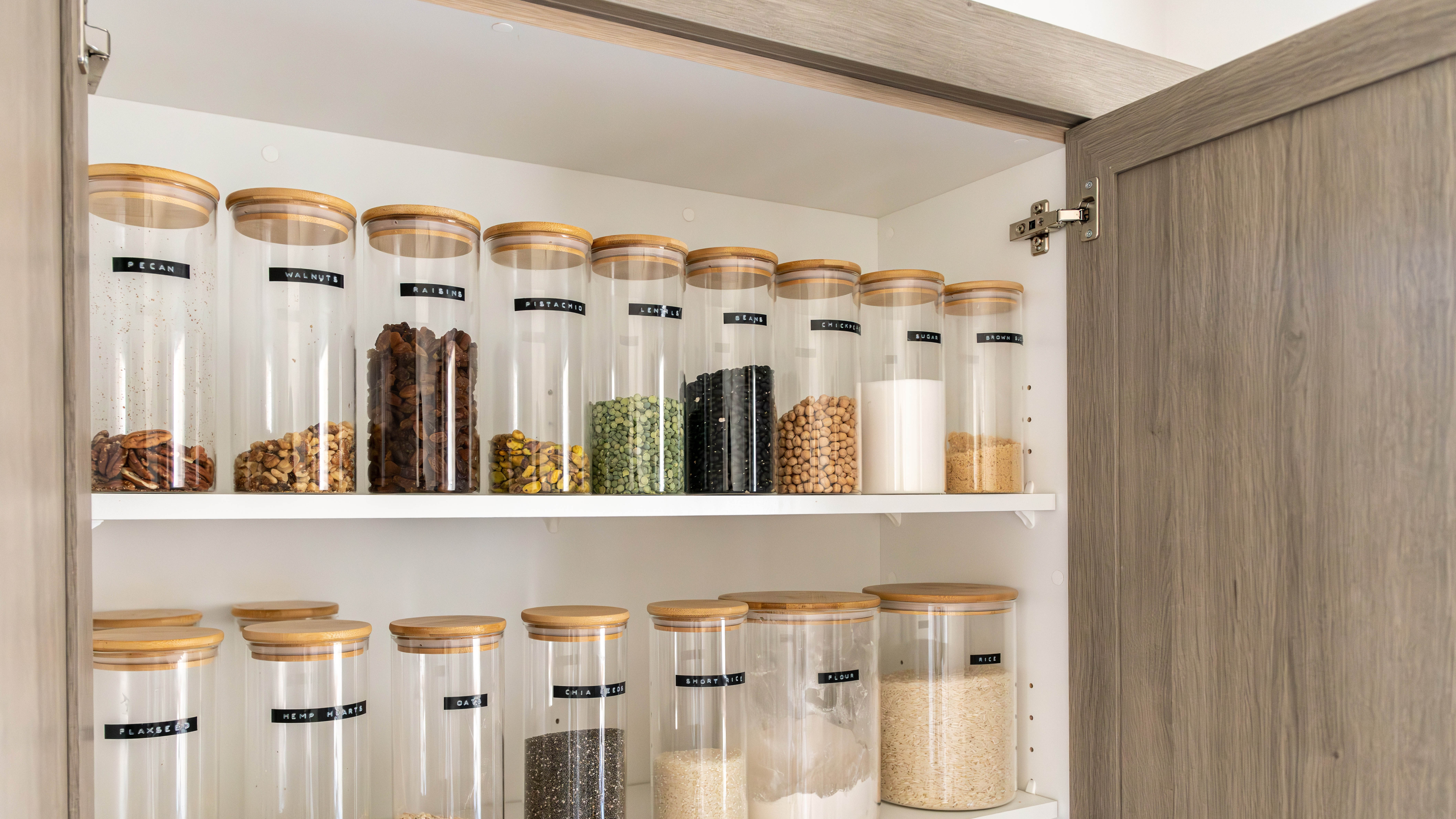 Labelled jars in pantry