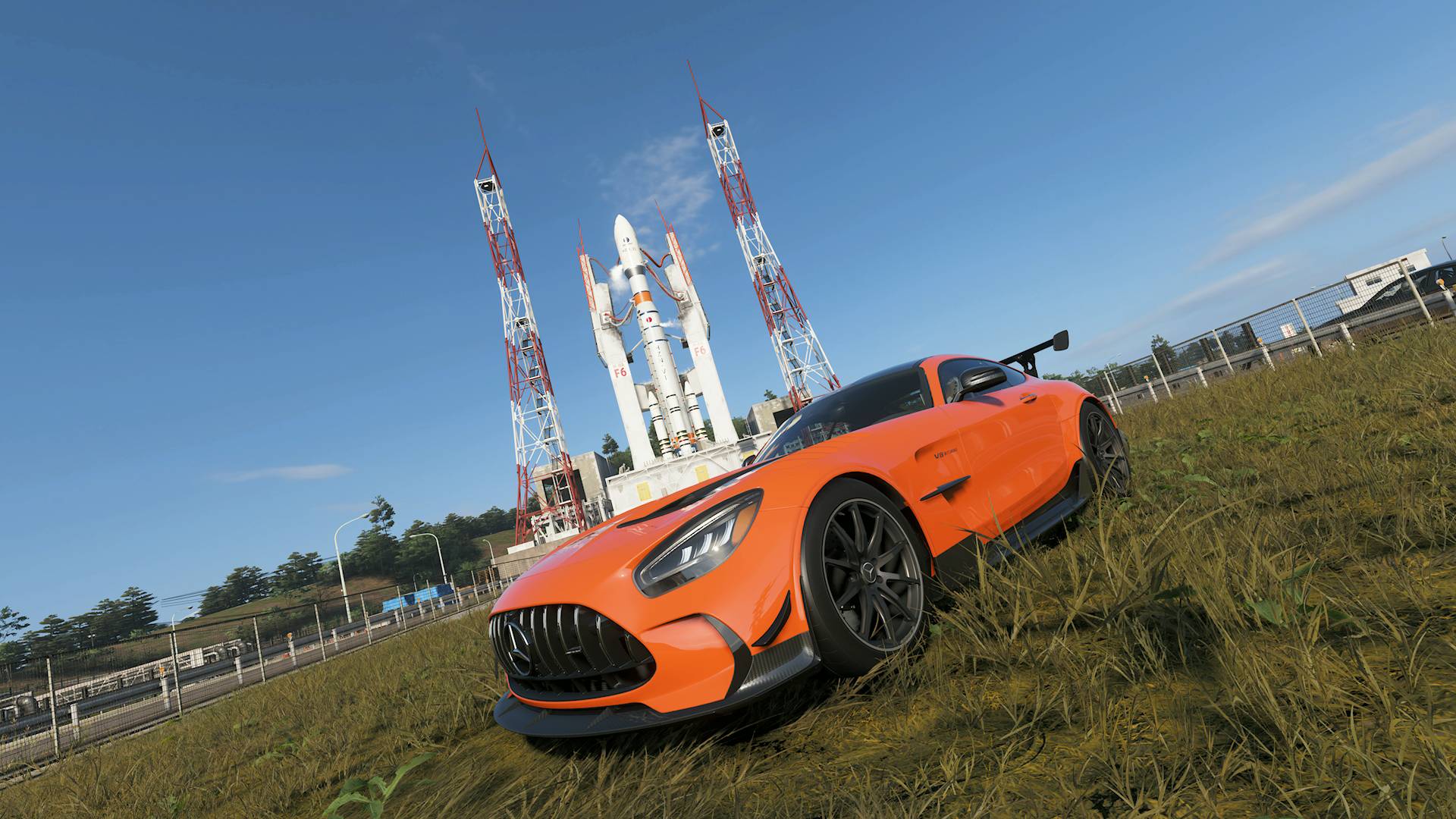 Forza Horizon 6 astrotoy photo challenge orange mercedes track toy car in front of rocket launch facility