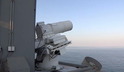 Watch the U.S. Navy field-test its fully operational laser cannon, take out a drone
