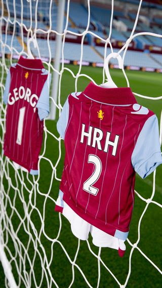 Two Aston Villa football shirts made for Prince George and Princess Charlotte in 2015