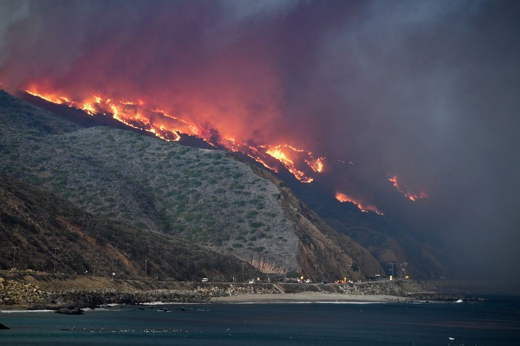 The Woolsey Fire reaches the Pacific Ocean.