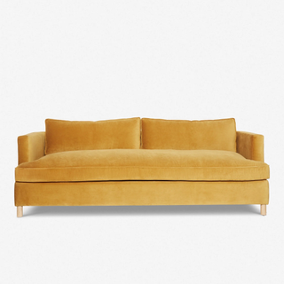 mustard yellow single-cushion sofa