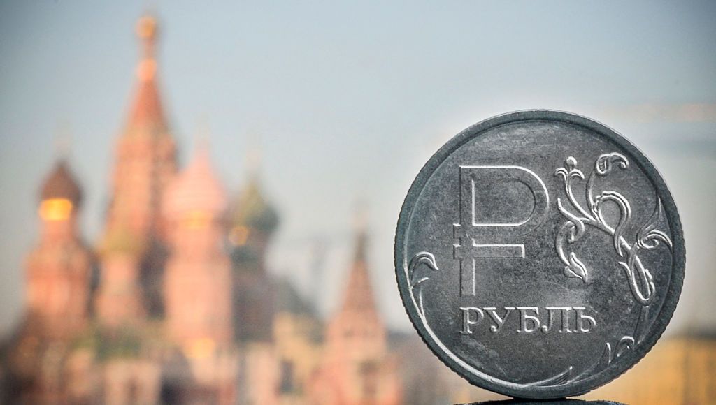 Russian ruble in front of St. Basil&amp;#039;s cathedral in Moscow