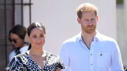 Prince Harry, Duke of Sussex and Meghan, Duchess of Sussex visit the Nyanga Township during their royal tour of South Africa