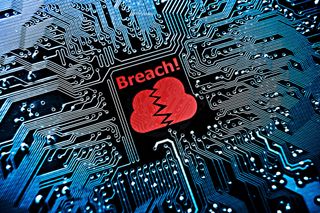 A processor with a red cloud broken in two with a word beneath: 'BREACH!'