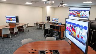 An active learning collaboration table powered by Extron AVoIP.