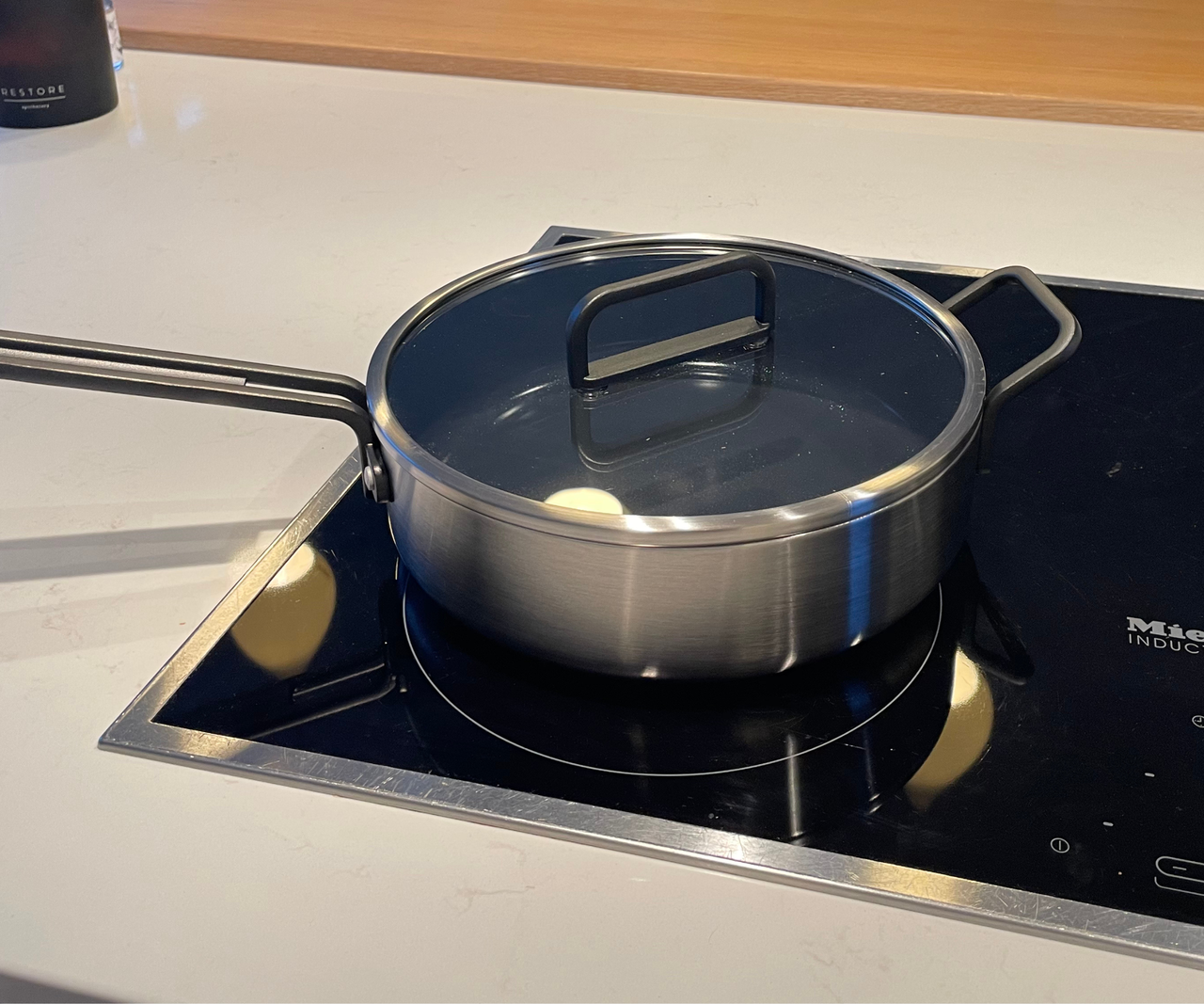 The stainless steel 'Stanley Pan' from Stanley Tucci's cookware range on my induction hob