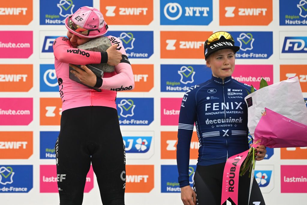 ROUBAIX FRANCE APRIL 08 Alison Jackson of Canada and Team EF EducationTibcoSvb L celebrates at podium as race winner with the cobblestoneracetrophy during the 3rd ParisRoubaix Femmes 2023 a 1454km one day race from Denain to Roubaix UCIWWT on April 08 2023 in Roubaix France Photo by Luc ClaessenGetty Images