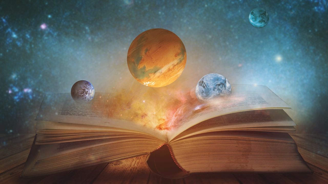 The Lion&#039;s Gate Portal: Book of the universe - opened magic book with planets and galaxies. Elements of this image furnished by NASA - stock photo