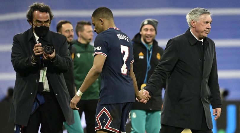 PSG&#039;s Kylian Mbappe shakes hands with Real Madrid coach Carlo Ancelotti after the teams&#039; Champions League clash at the Santiago Bernabeu in 2022.