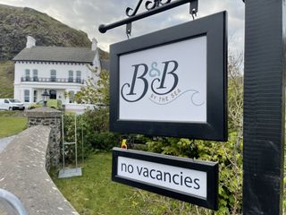 No vacancies sign at the B&B by the Sea.