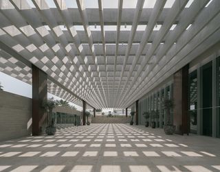 The Ned Doha by David Chipperfield outdoors with concrete pergola