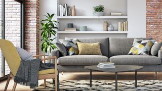 Pale grey living room with wall shelves in alcove behind a grey upholstered sofa