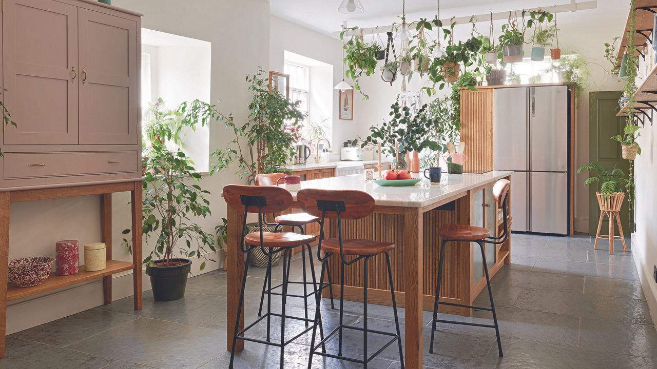 Kitchen with wooden oak cabinets and island