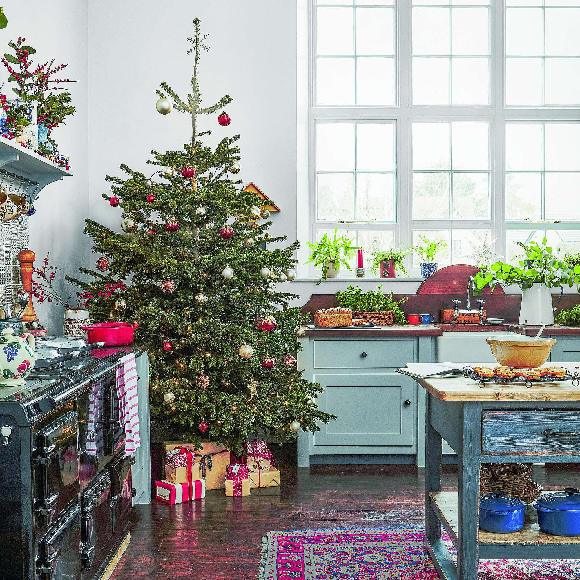 Christmas tree in corner of the kitchen