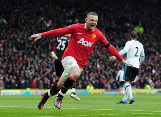 Wayne Rooney of Manchester United celebrates scoring his second goal during the Barclays Premier League match between Manchester United and Liverpool at Old Trafford on February 11, 2012 in Manchester, England. (Photo by Shaun Botterill/Getty Images)