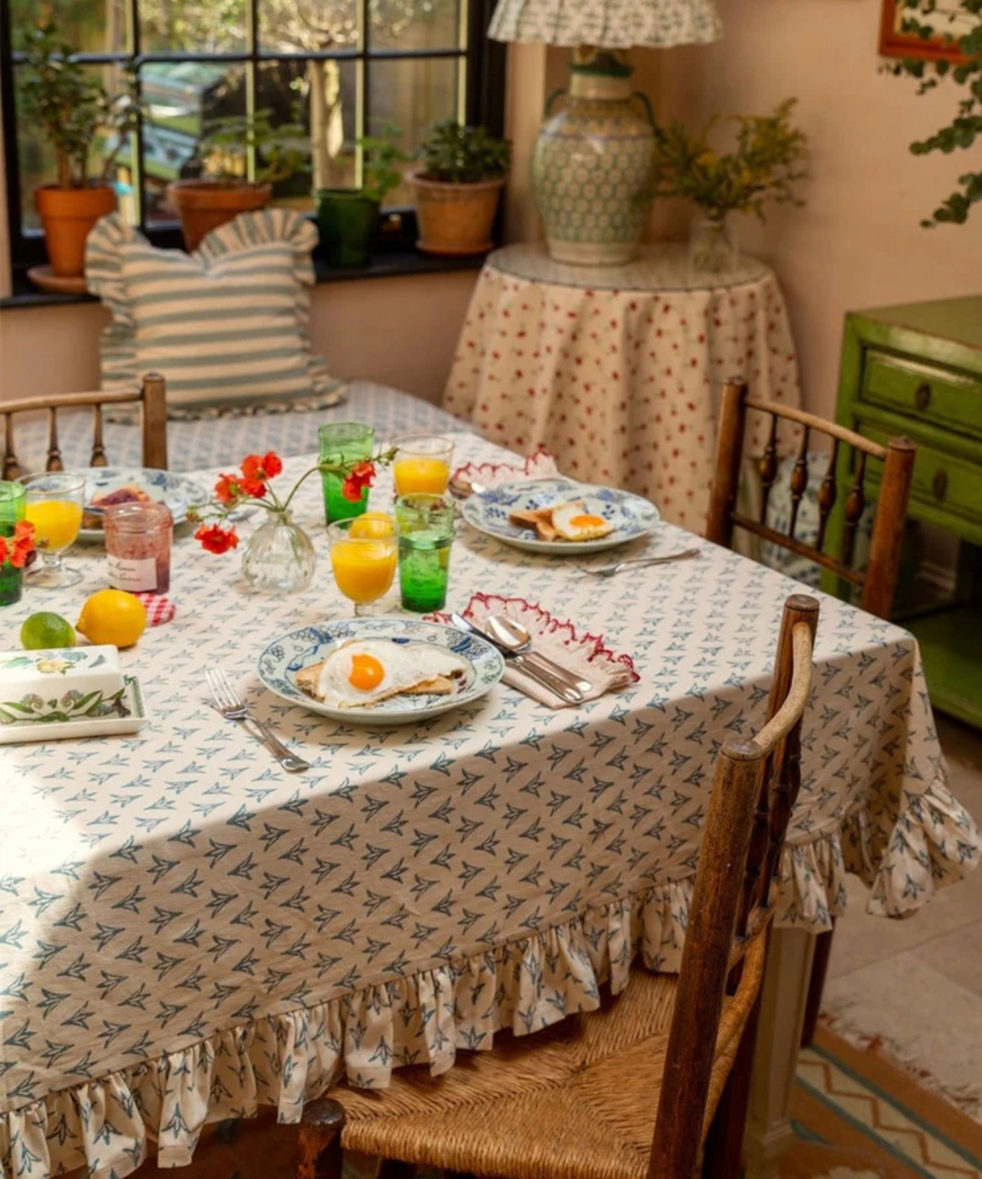 Ruffled tablecloth in at rustic dining room setting