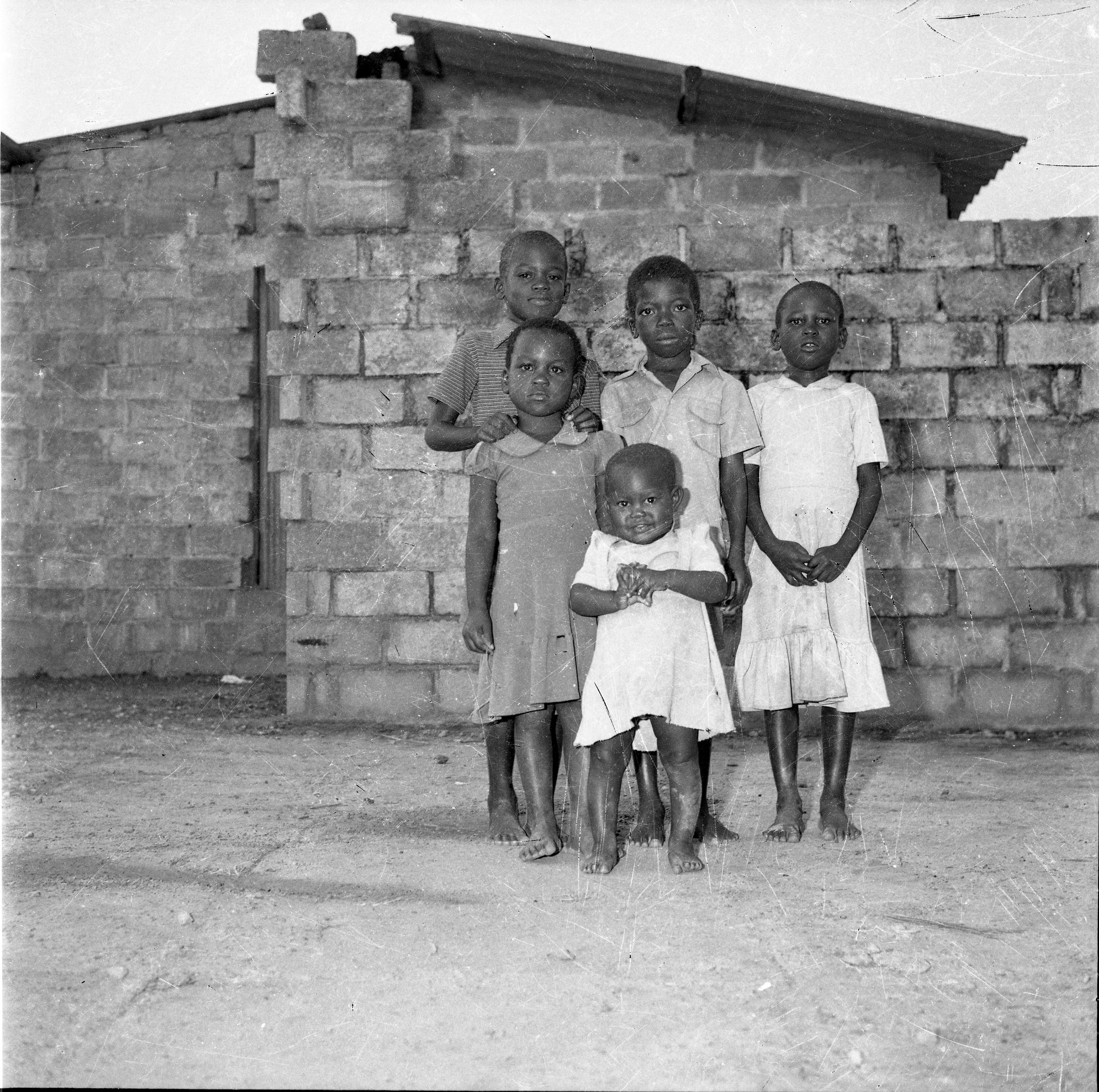 black and white images of people posing for camera