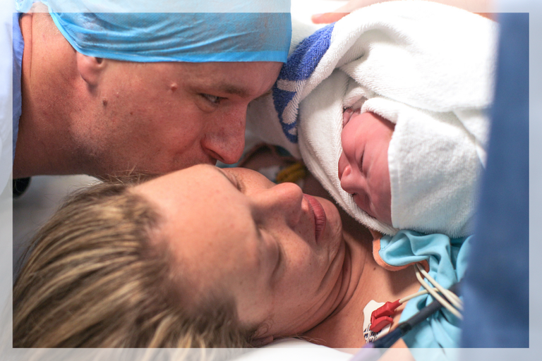 Woman and partner welcome their newborn child after a caesarean