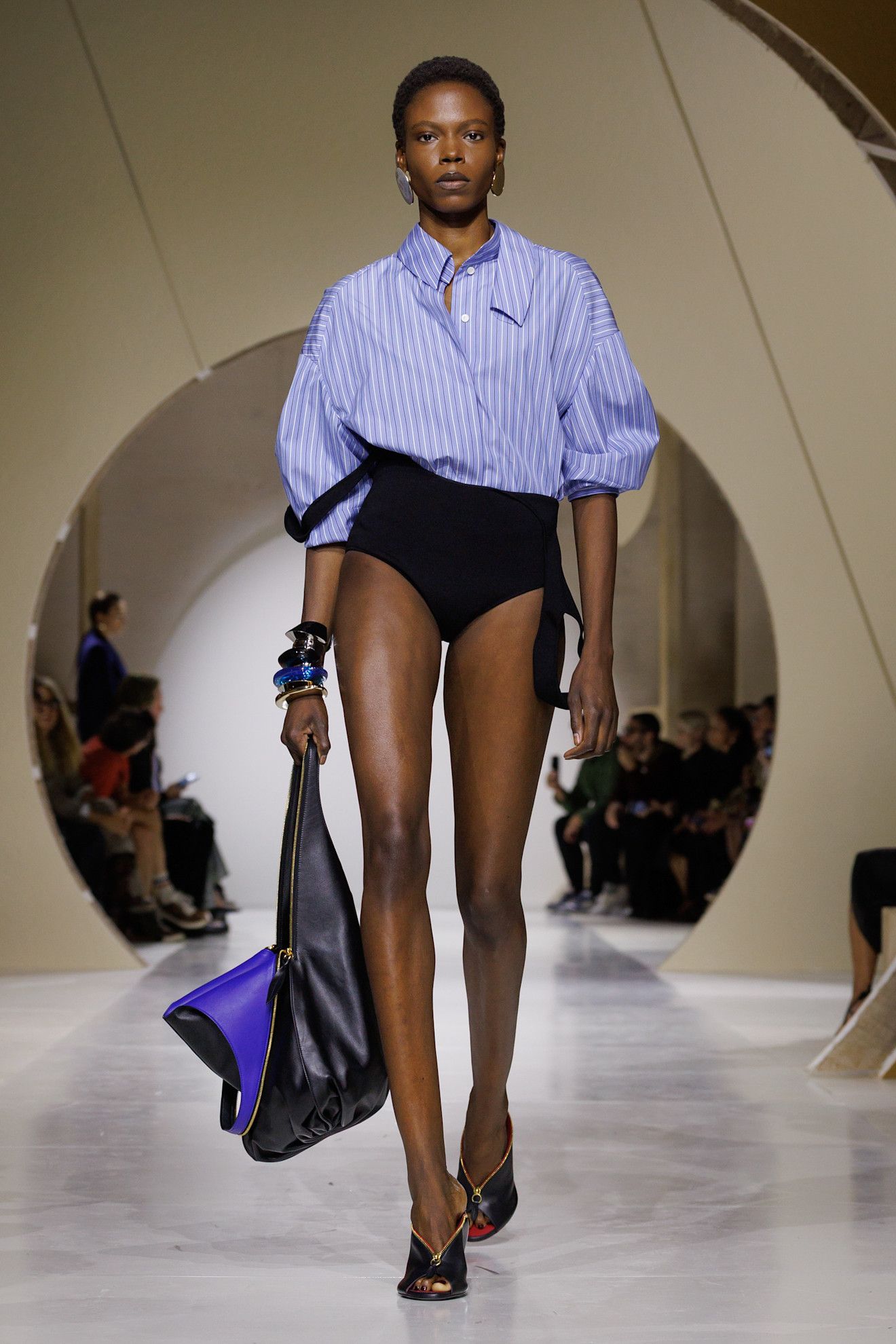 a model walks the givenchy runway.