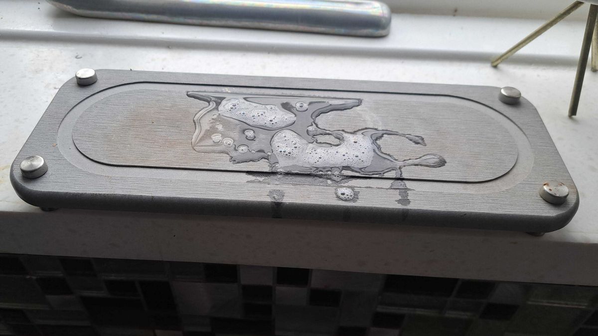 stone tray with soapy water