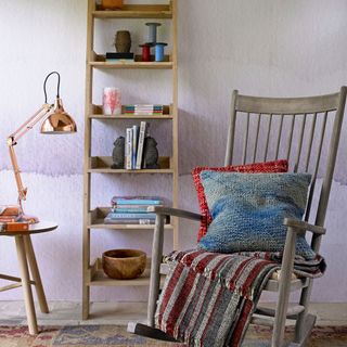 Country living room with rocking chair and ladder shelf