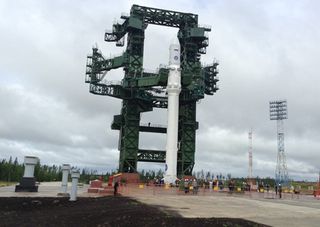 Russia's first Angara rocket stands atop its launch pad awaiting a debut test flight at the country's Plesetsk Cosmosdrome. The rocket successfully launched on July 9, 2014, according to its builders at the Khrunichev State Research and Production Space