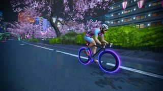 A rider in Zwift on a Tron bike