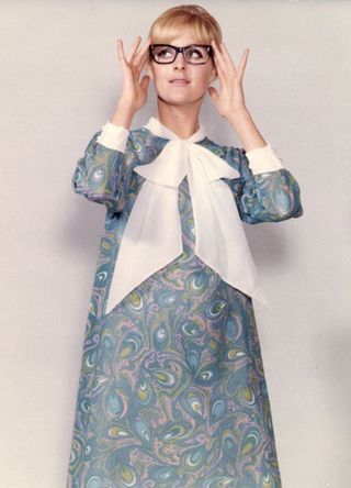 12th September 1967: A model wearing a paisley patterned A-line mini-dress.