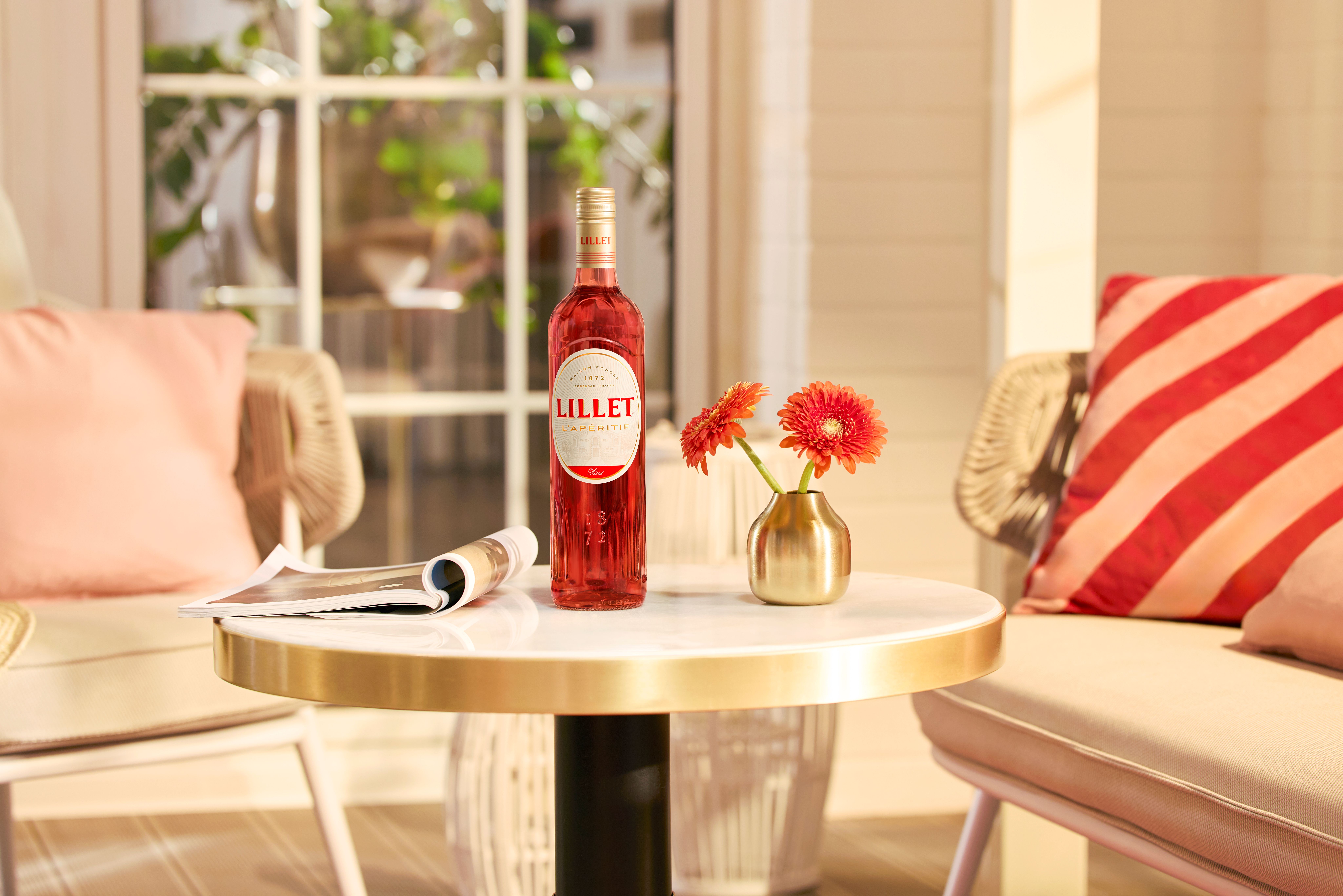 a bottle of lillet aperitif on a table