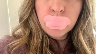 A close up of Pink mouth tape stuck over Senior Sleep Editor Claire Davies' mouth