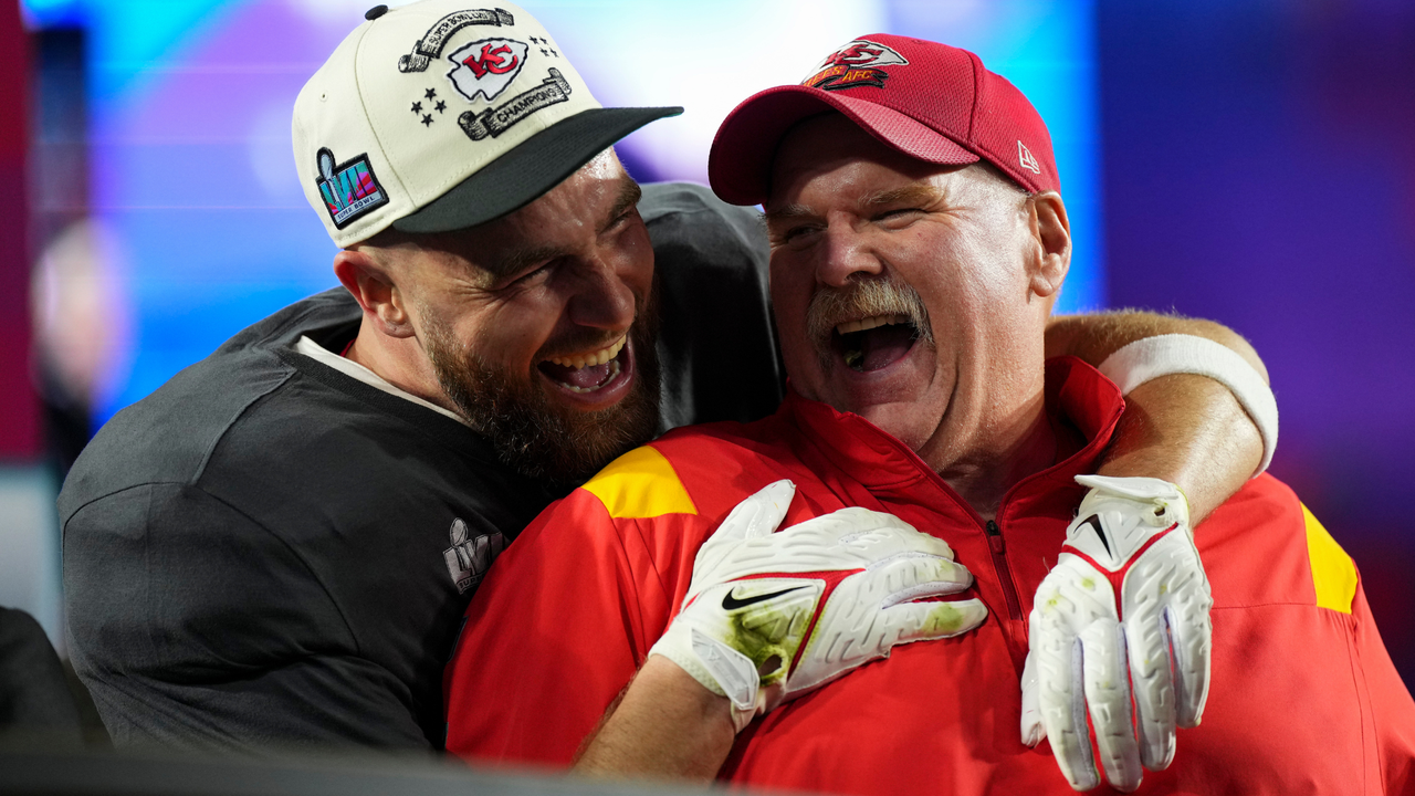 Andy Reid of the Kansas City Chiefs celebrates with Travis Kelce #87 after Super Bowl LVII against the Philadelphia Eagles at State Farm Stadium on February 12, 2023 in Glendale, Arizona.