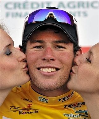 Mark Cavendish (High Road) takes the first yellow leader's jersey.