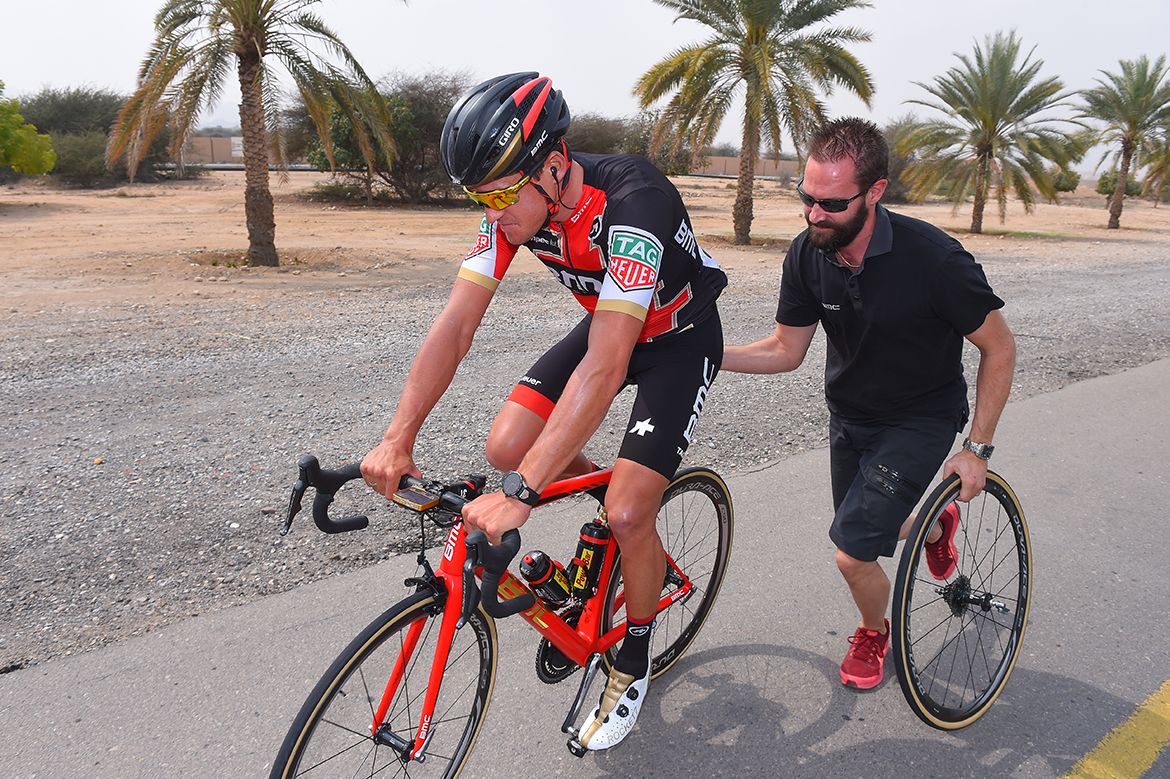 Greg Van Avermaet gets a shove after suffering a mechanical