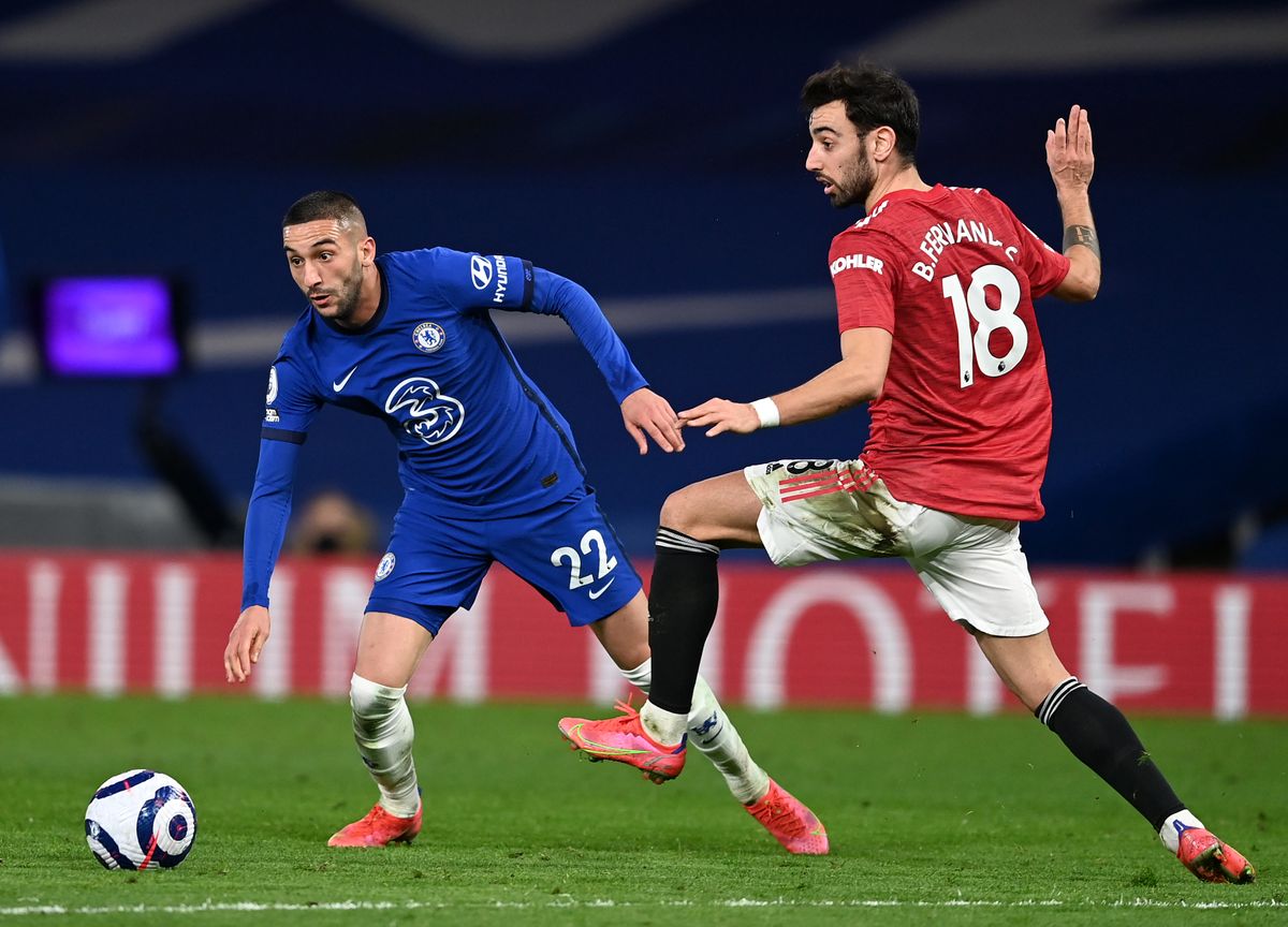 Bruno Fernandes challenges Hakim Ziyech for the ball