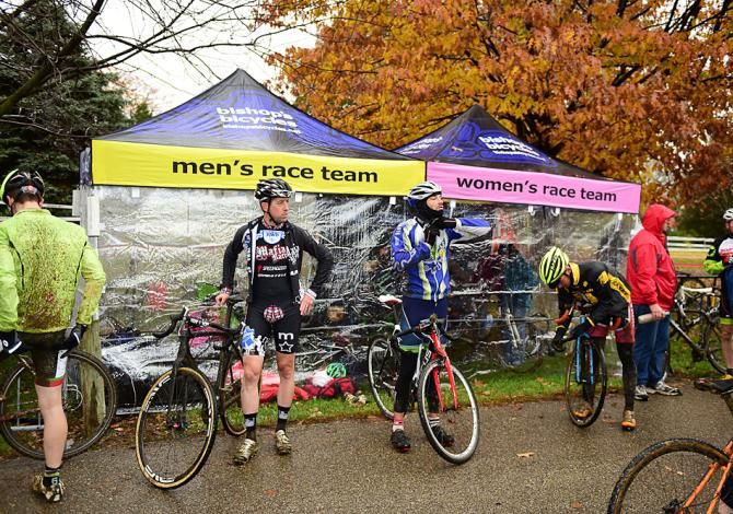 Cold rain and wind saw racers looking for warmer clothes and the shelter of team tents