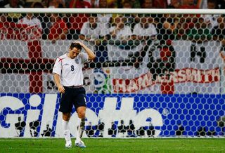 Frank Lampard of England reacts to his missed penalty in a penalty shootout during the FIFA World Cup Germany 2006 Quarter-final match between England and Portugal played at the Stadium Gelsenkirchen on July 1, 2006 in Gelsenkirchen, Germany.