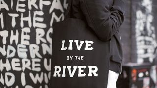 Camden market tote bag reading 'Live by the river'