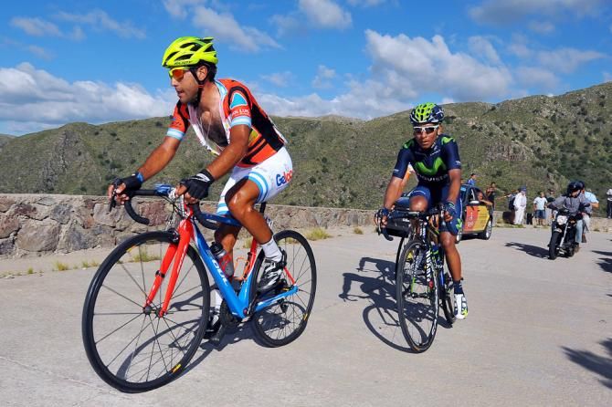 Daniel Diaz climbs ahead of Nairo Quintana.