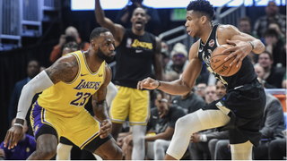 LeBron James (L) and Giannis Antetokounmpo will play on Christmas Day in separate games on ESPN and ABC