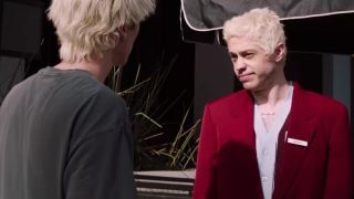 Pete Davidson looking questionably at Machine Gun Kelly in Good Mourning