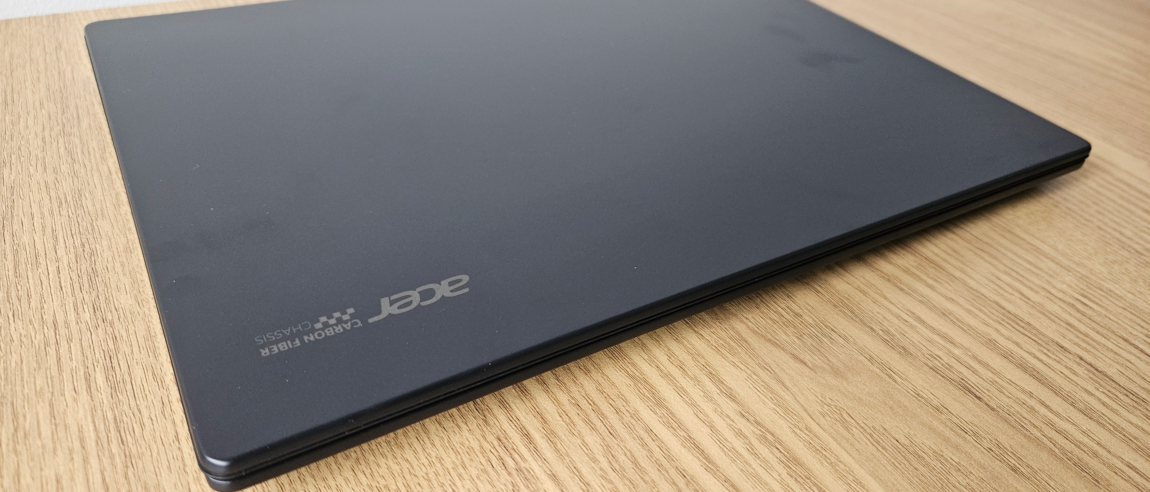 The Acer TravelMate P6 14 AI on a desk