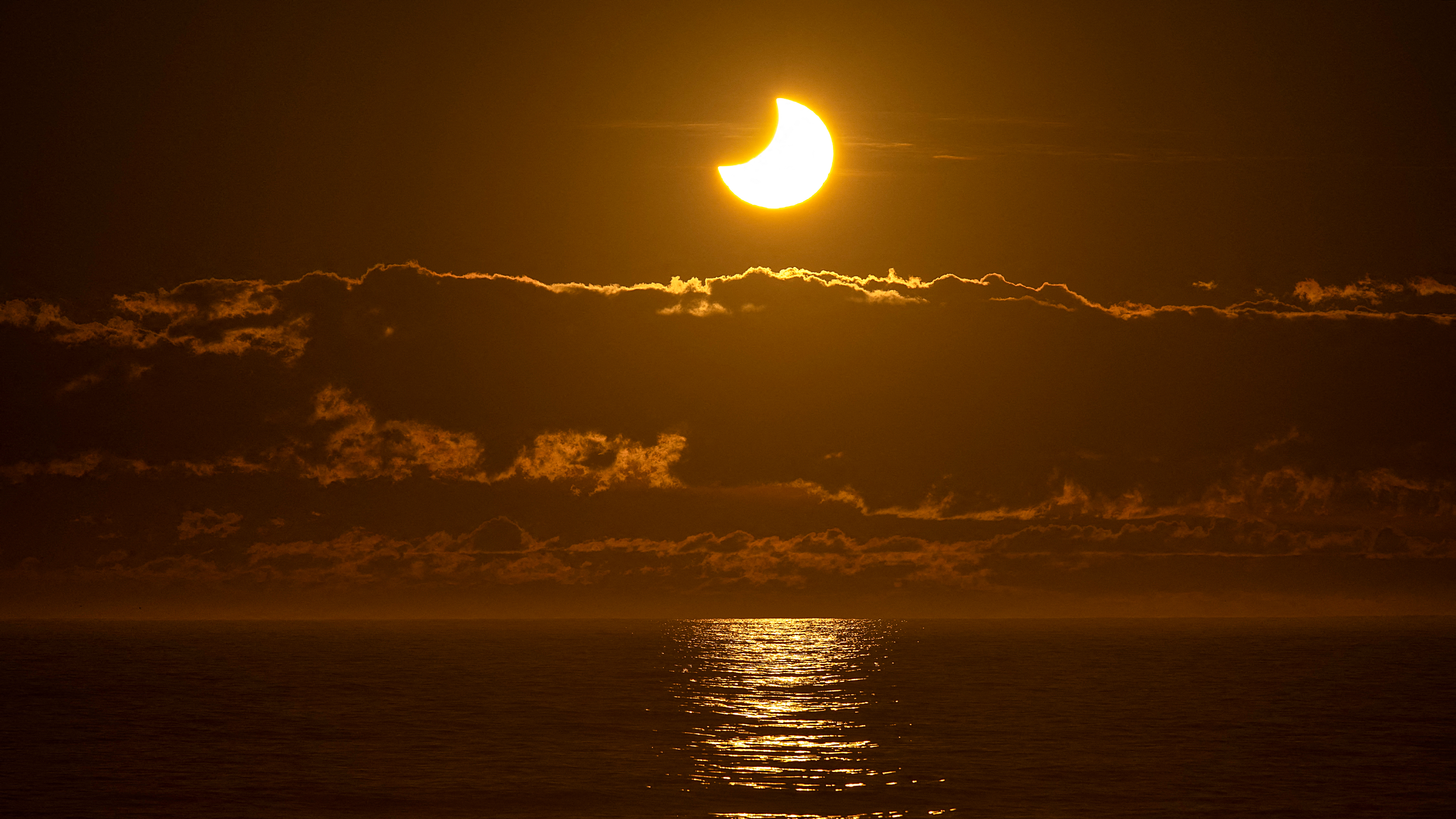 View of a partial solar eclipse&nbsp;at New Brighton, a coastal suburb of Christchurch, on September 22, 2025.