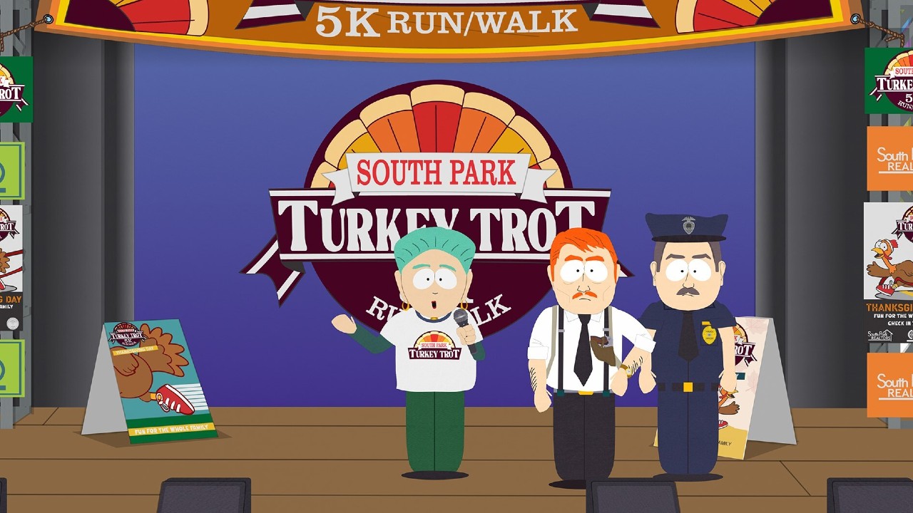 The mayor and police speak onstage during the South Park Turkey Trot 5k Run/Walk