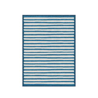 An indigo rectangular rug with a white striped pattern