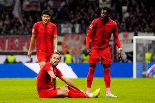 FRANKFURT AM MAIN, GERMANY - OCTOBER 06: Kim Min-Jae, Harry Kane and Alphonso Davies of Bayern Munich look on during the Bundesliga match between Eintracht Frankfurt and FC Bayern München at Deutsche Bank Park on October 06, 2024 in Frankfurt am Main, Germany. (Photo by M. Donato/FC Bayern via Getty Images)