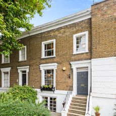 bungalow with brick wall and sash window